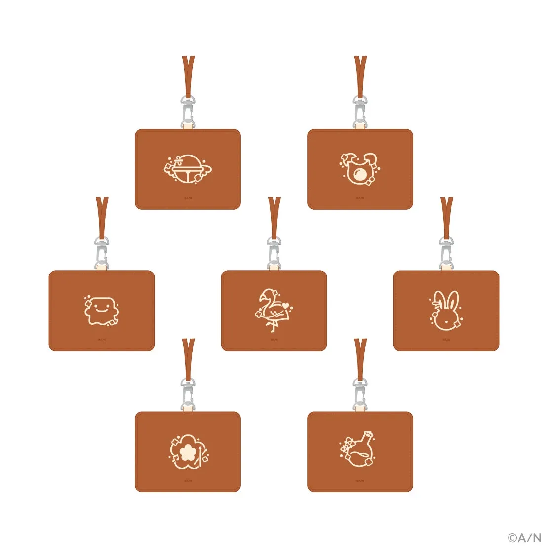 茶色のパスケースが7つ並んだ画像。それぞれ異なるデザインのキャラクターが描かれています。