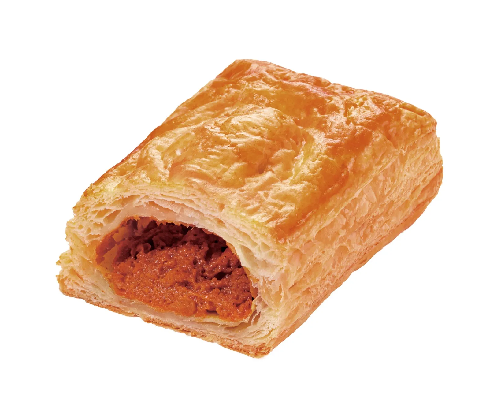 パイ生地の中にミートフィリングが入った食べ物のクローズアップ。