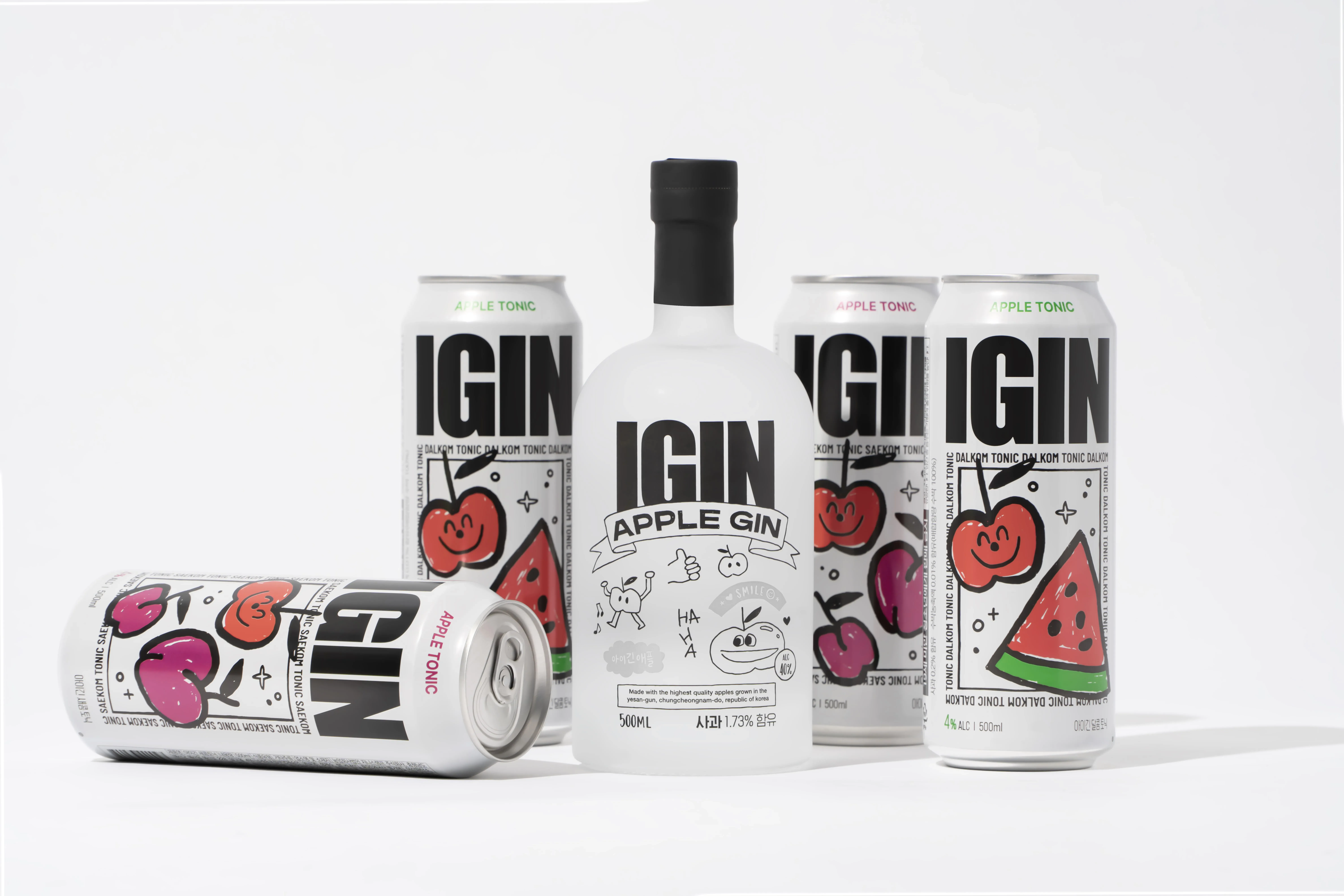 白い背景に、アップルジンとアップルトニックの缶が配置された写真。ボトルと缶には「IGIN」のロゴと、リンゴやスイカのイラストが描かれている。