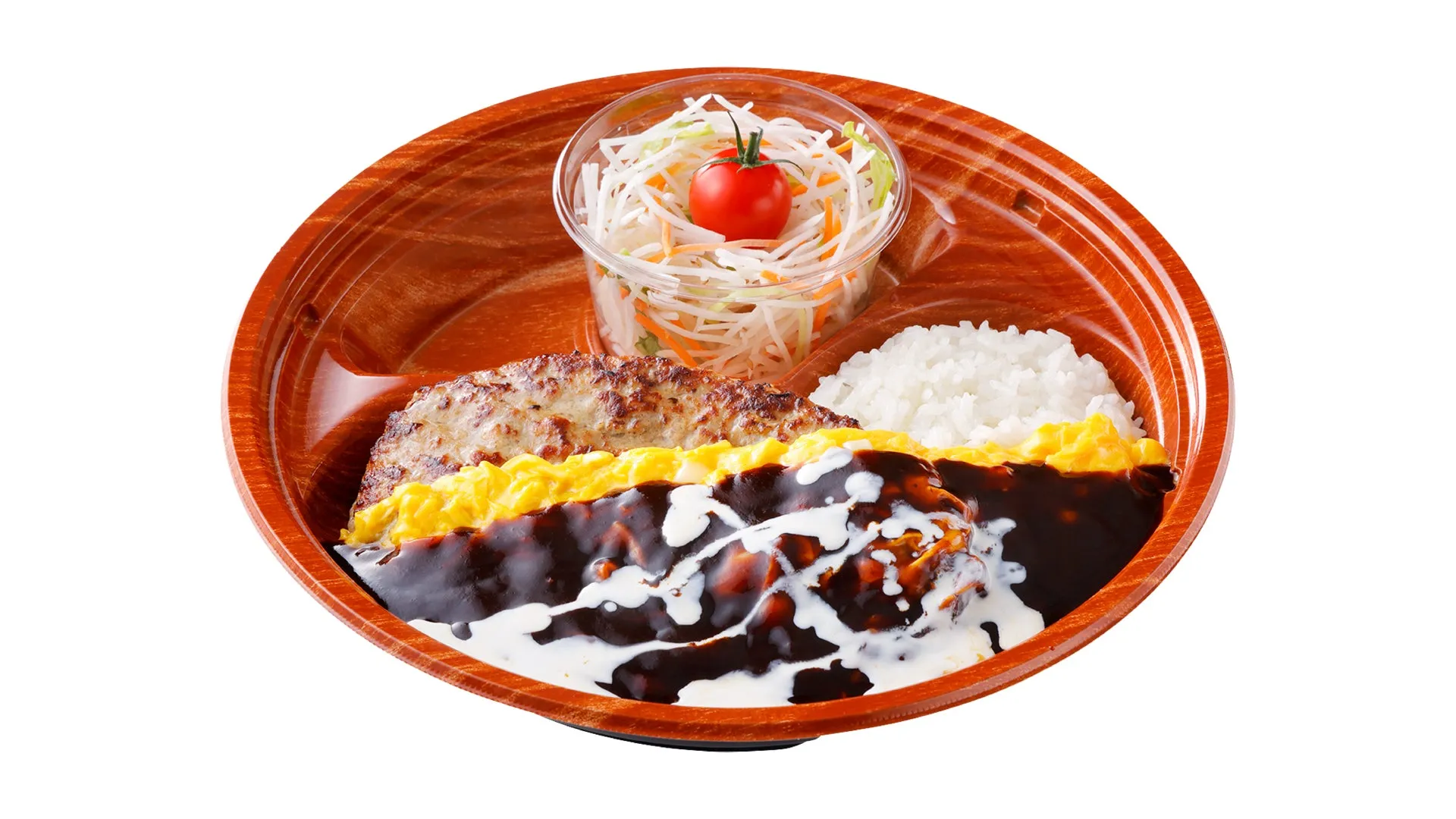弁当箱に入ったハンバーグとご飯、サラダのセットの画像です。ハンバーグにはデミグラスソースとクリームがかかっており、卵焼きが添えられています。サラダにはミニトマトが乗っています。