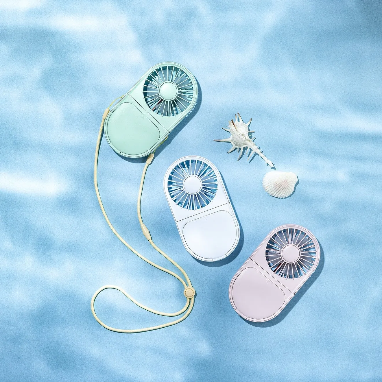 ポータブルファンと貝殻