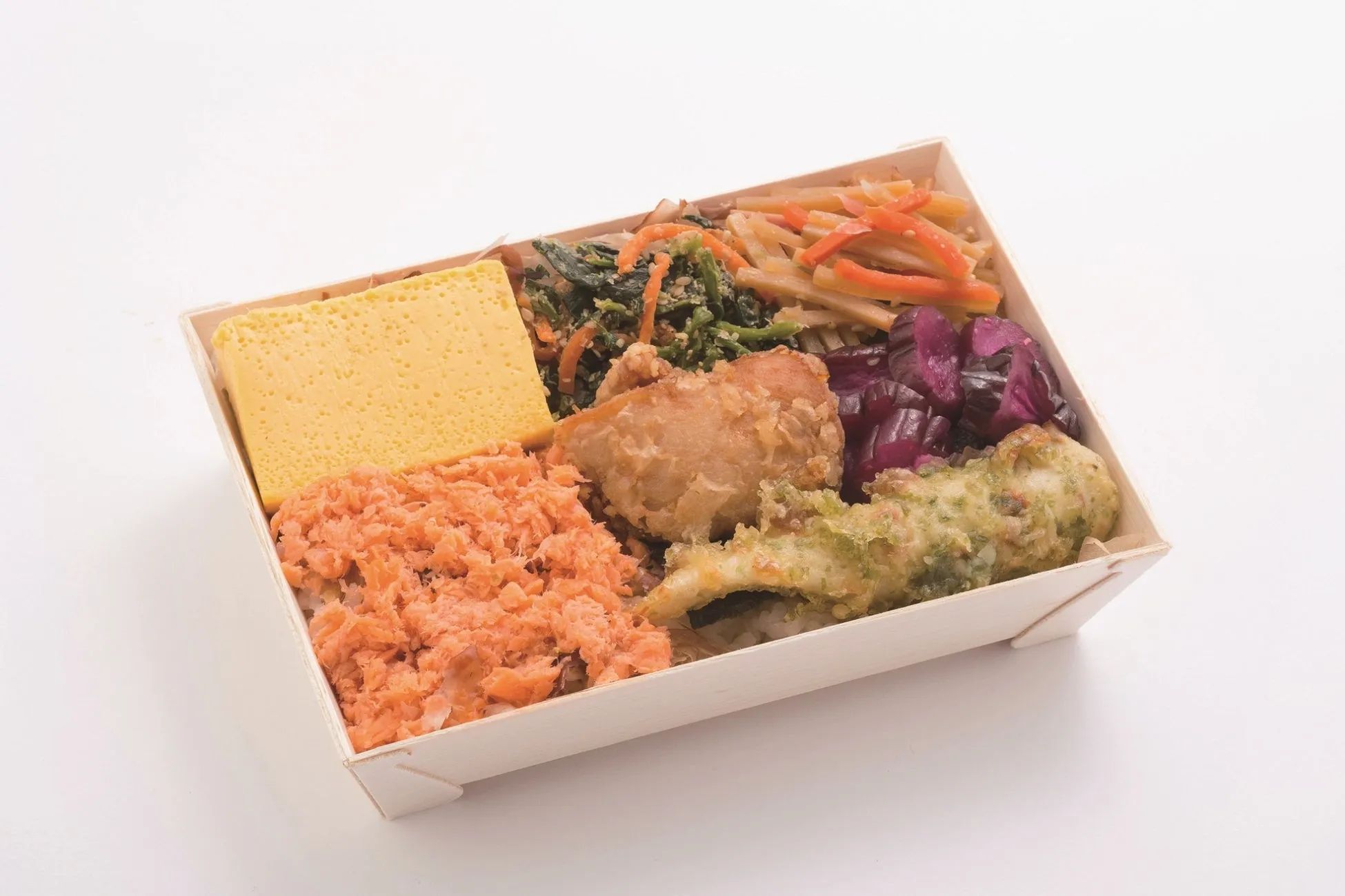 弁当箱に入った様々なおかずの集合写真