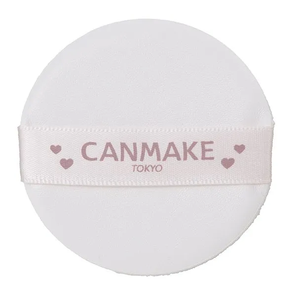 白い丸いパフ。パフには「CANMAKE TOKYO」のロゴが入ったバンドが付いている。