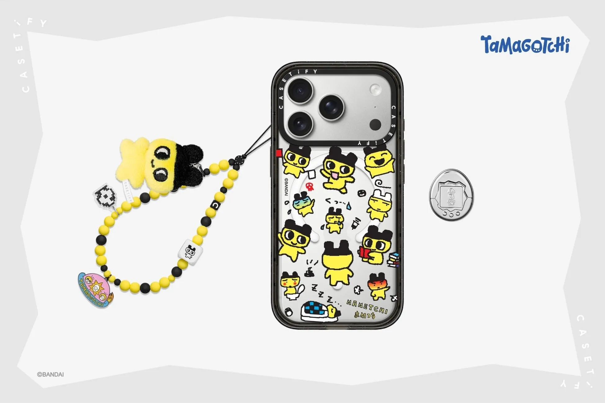 Tamagotchiのキャラクターが描かれたスマホケースとストラップの画像です。Tamagotchiのロゴやキャラクターがデザインされています。
