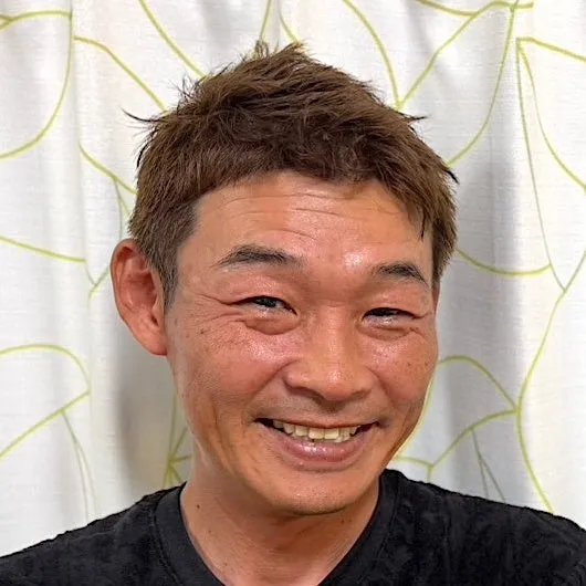 新垣憲良社長の顔写真