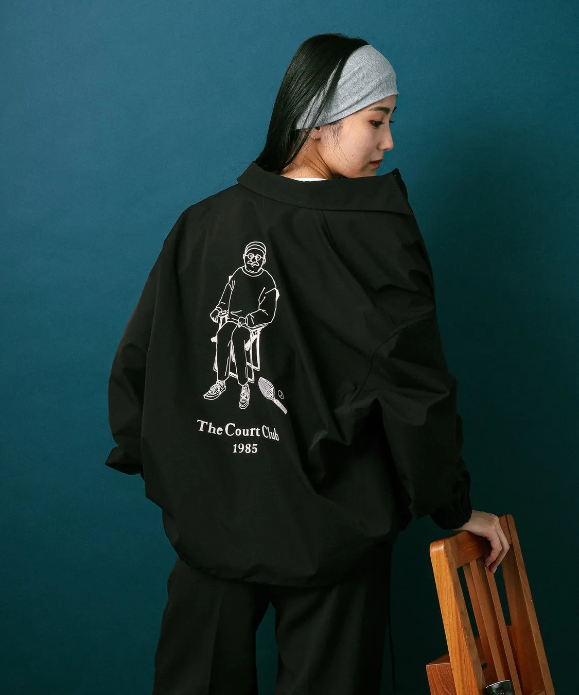 Reebokコーチジャケットバックプリント