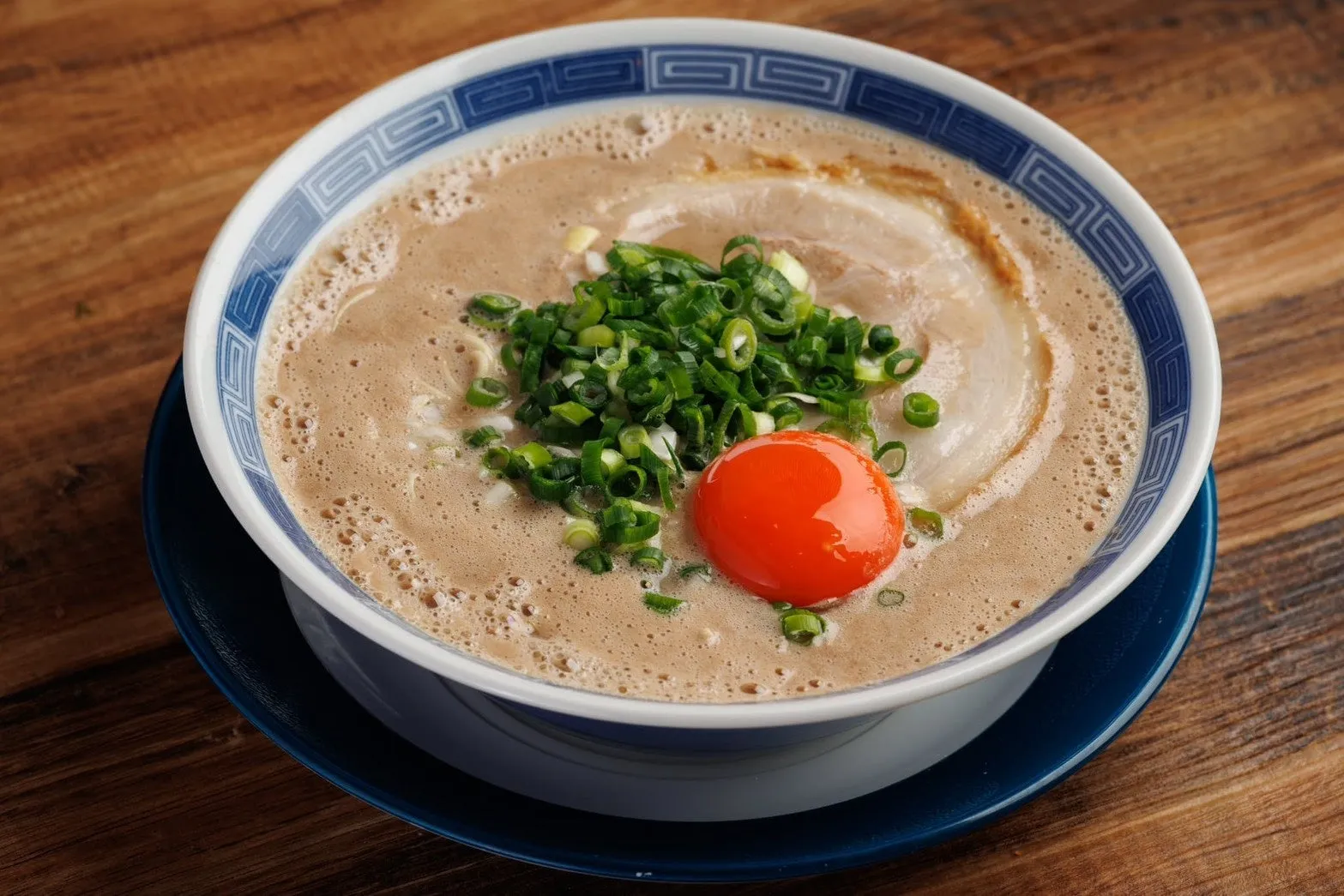 熟成豚骨 箕輪家のロゴ