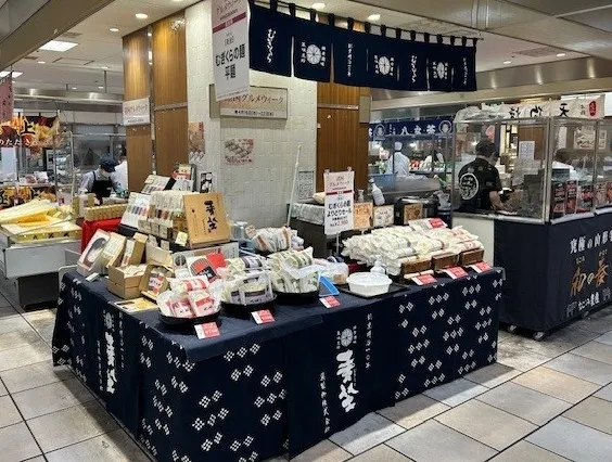 百貨店での催事出店の実績概要がテーブル形式でまとめられています。