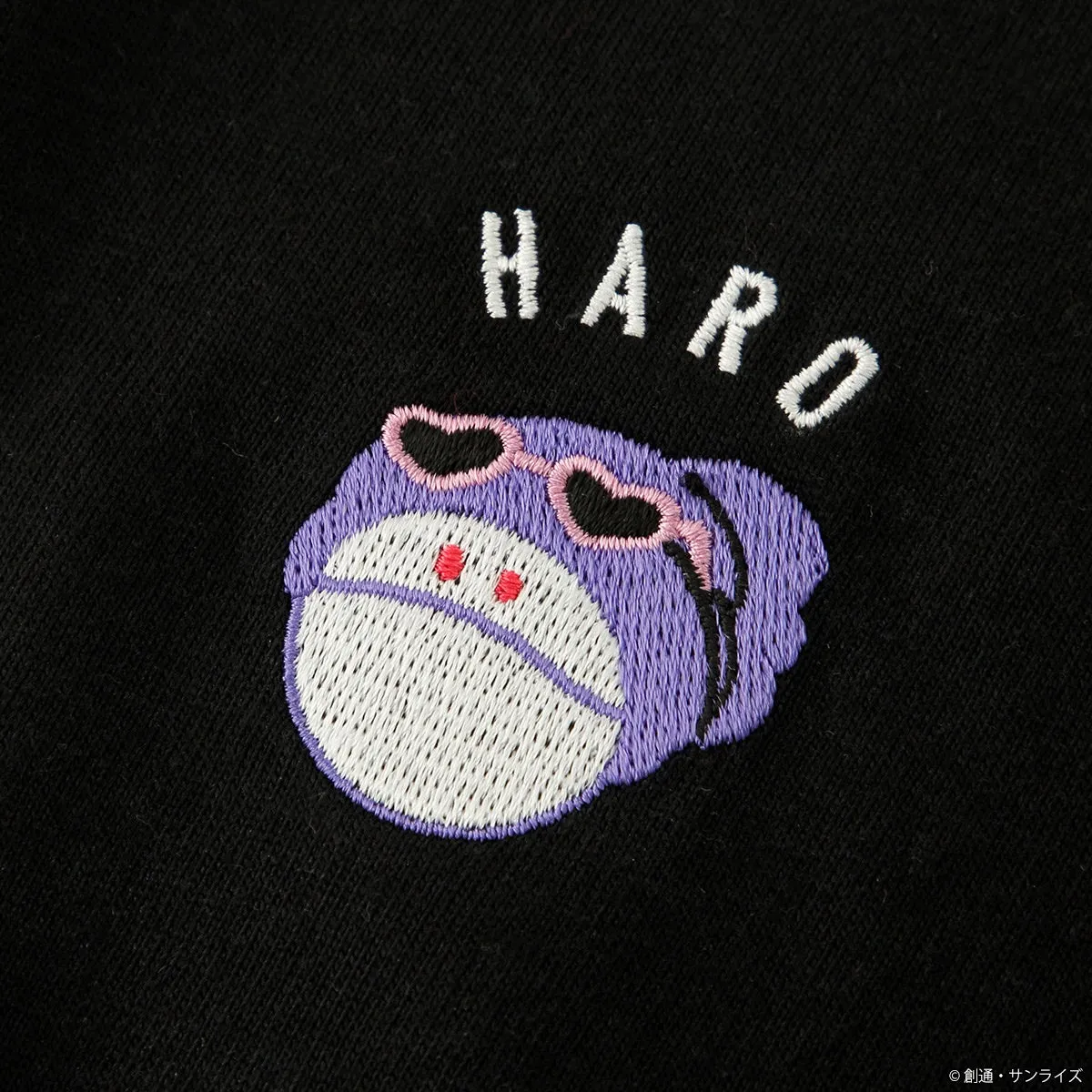 黒い生地に、サングラスをかけた紫色のハロの刺繍が施された画像です。ハロの上には「HARO」の文字が白で刺繍されています。
