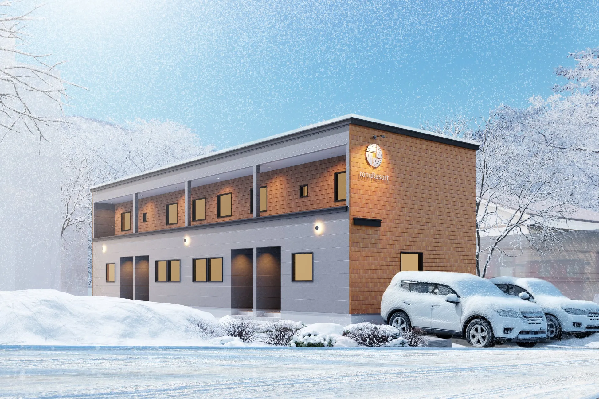雪景色の中にある2階建ての建物