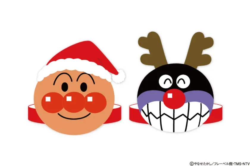 アンパンマンとバイキンマンがクリスマスを祝うイラストです。アンパンマンはサンタクロースの帽子をかぶり、バイキンマンはトナカイの角をつけています。