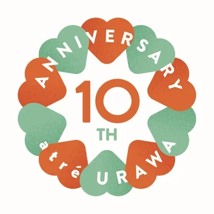 アトレ浦和の10周年を記念したロゴマークです。ハート型に配置された文字と数字が特徴的です。