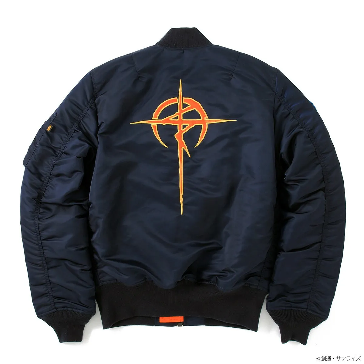 紺色のバックにオレンジ色のマークが入ったジャケット