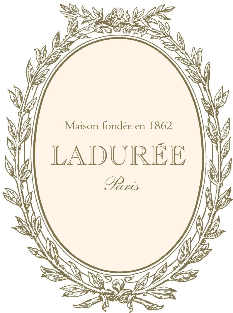 楕円形のフレームに囲まれた、LADURÉEのロゴ。フレームは葉で飾られ、上部にはリボンが描かれています。ロゴの下には「Paris」の文字があります。