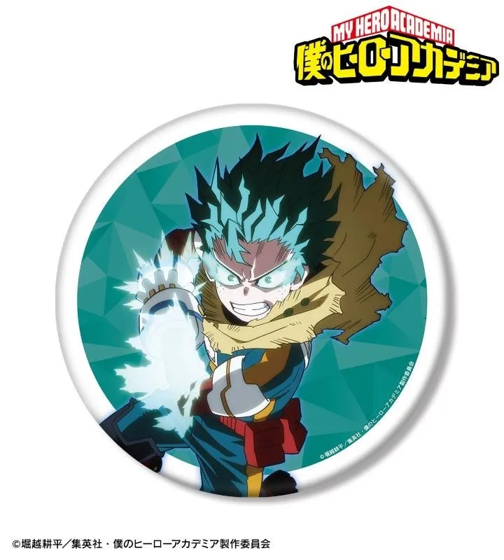 緑色の髪のキャラクターが描かれたバッジ。彼は興奮した表情で、手にエネルギーのようなものを集めている。