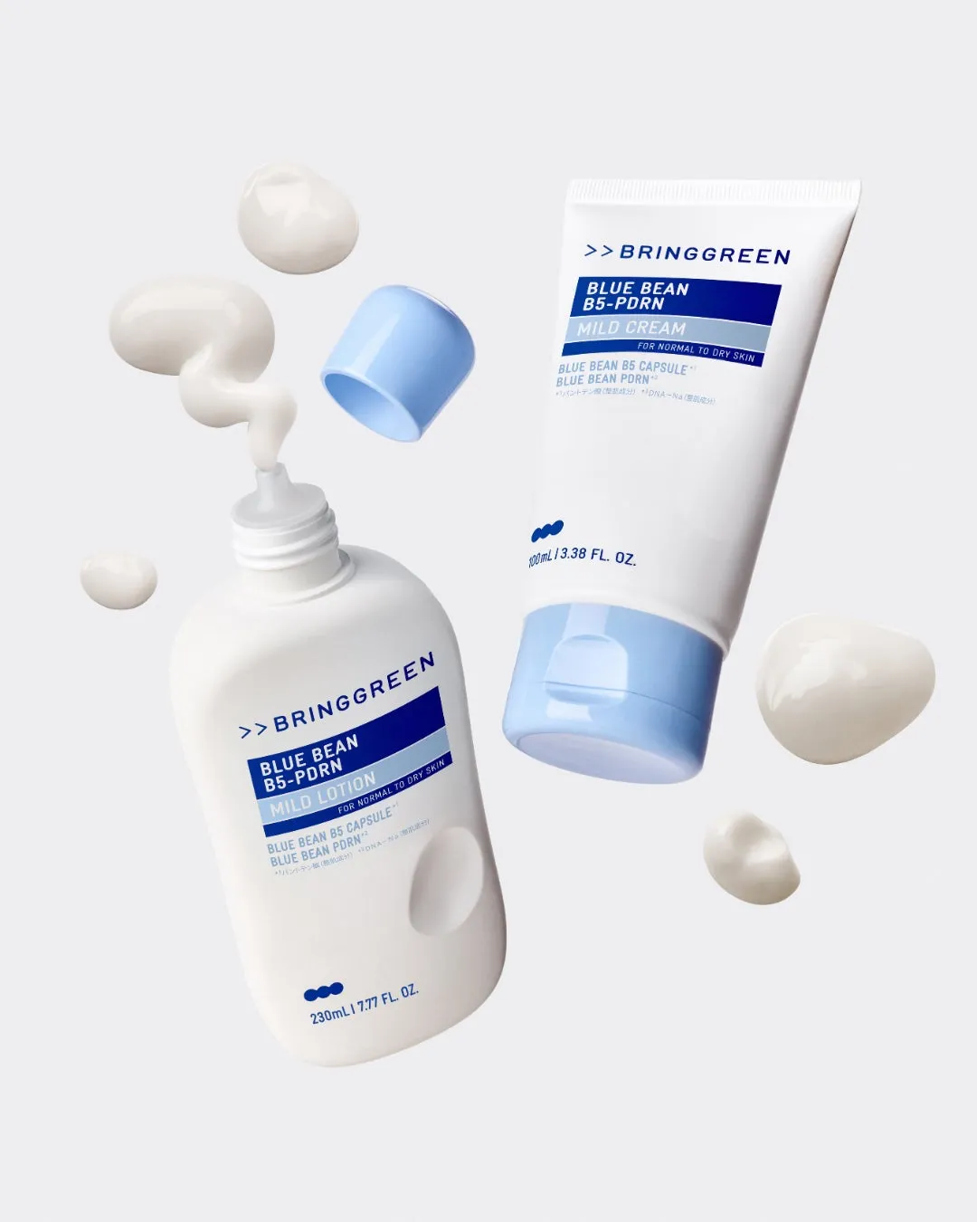 BRINGGREENのBLUE BEAN B5-PDRN MILD CREAMとMILD LOTIONの製品の写真。製品は白い容器で、一部はクリームが飛び出したように表現されている。背景は白。