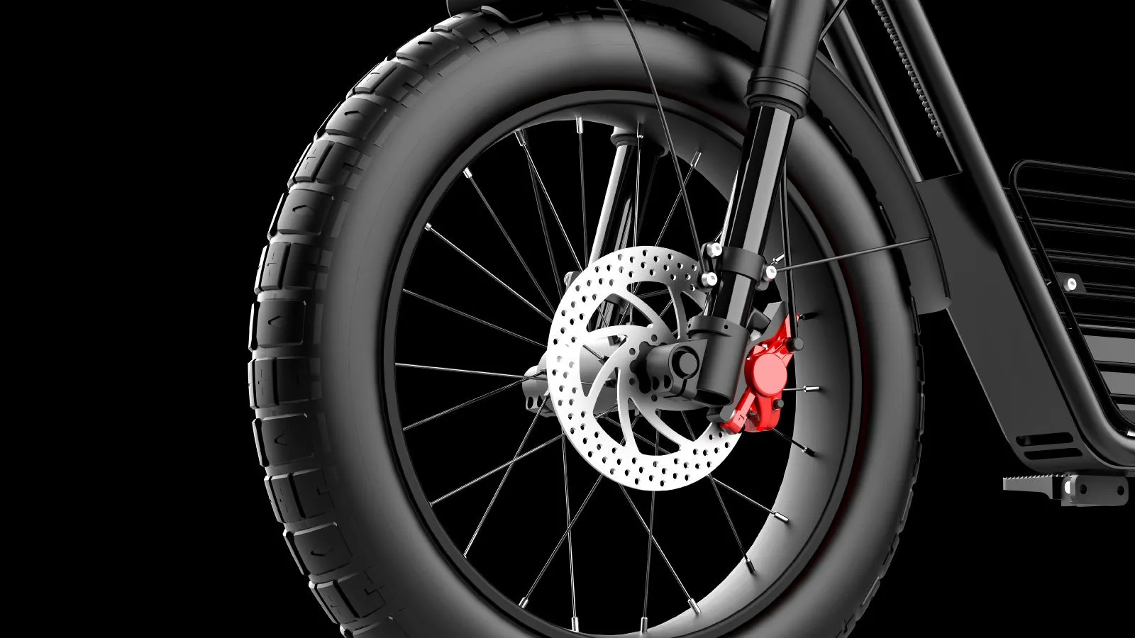 黒い背景に、バイクの車輪のクローズアップ画像。赤色のブレーキキャリパー、ディスクブレーキ、スポーク、タイヤ、サスペンションが写っています。