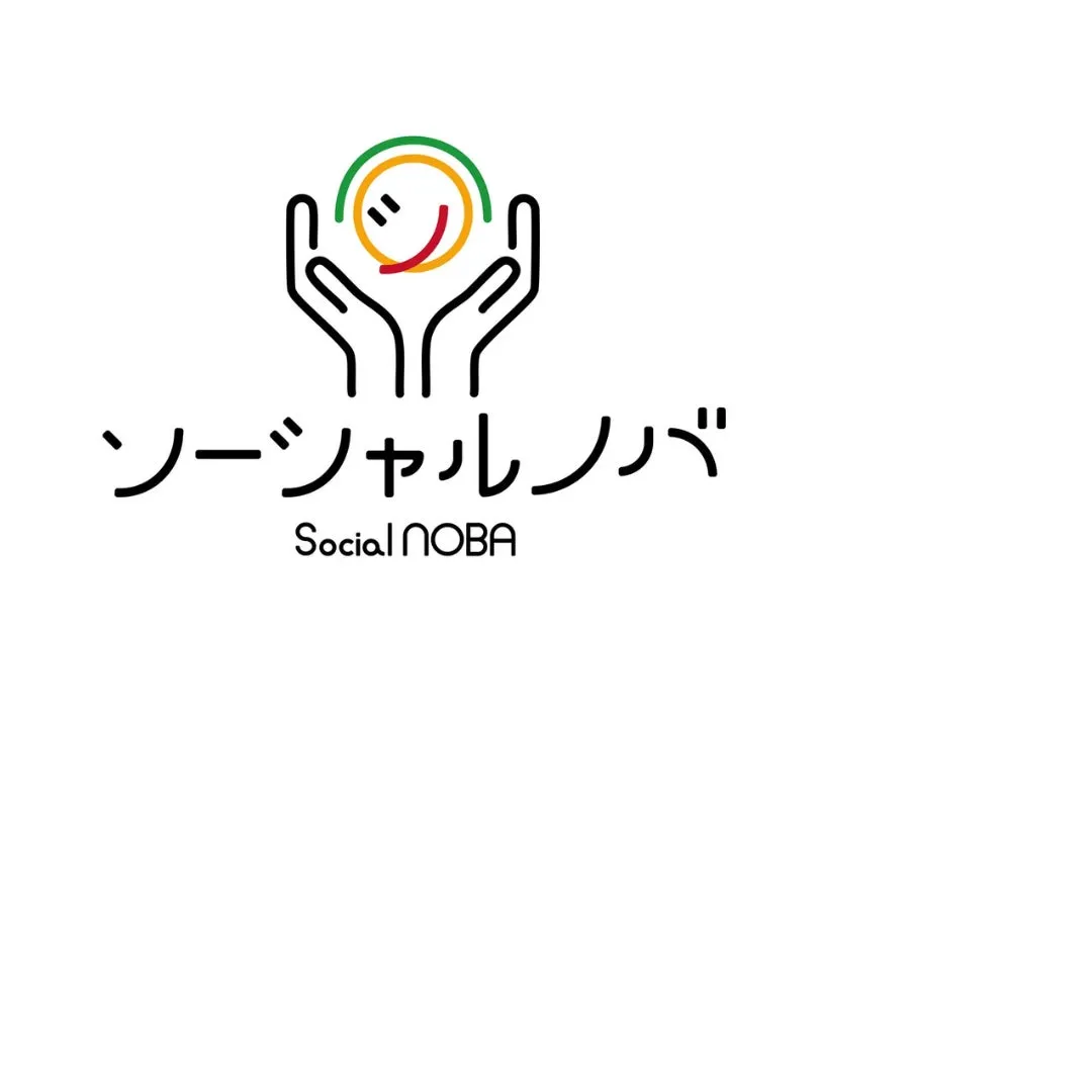 手のひらにスマイルマークが描かれたロゴ