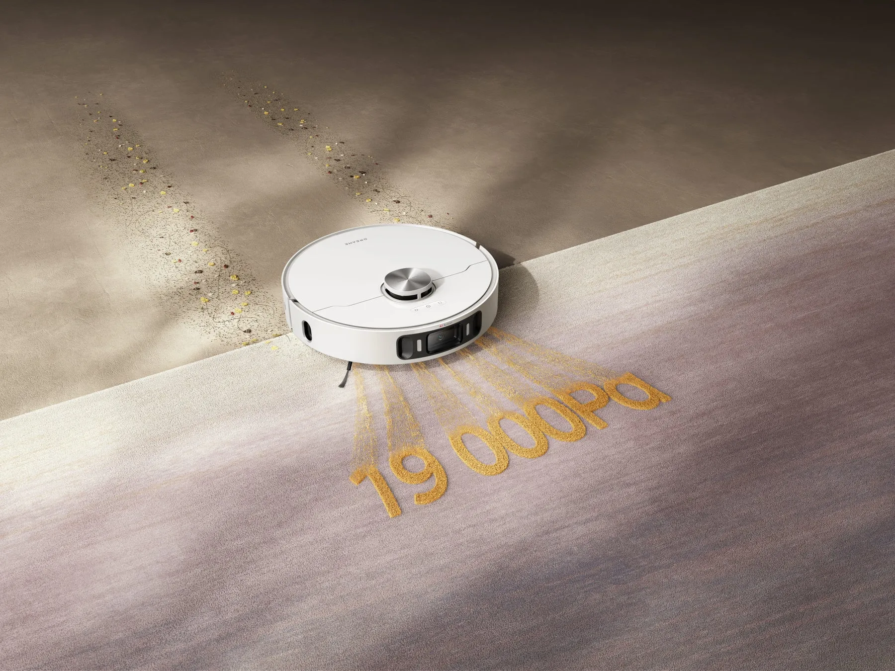 白いロボット掃除機が、砂のようなもので描かれた「19000Pa」という文字の上を掃除している様子