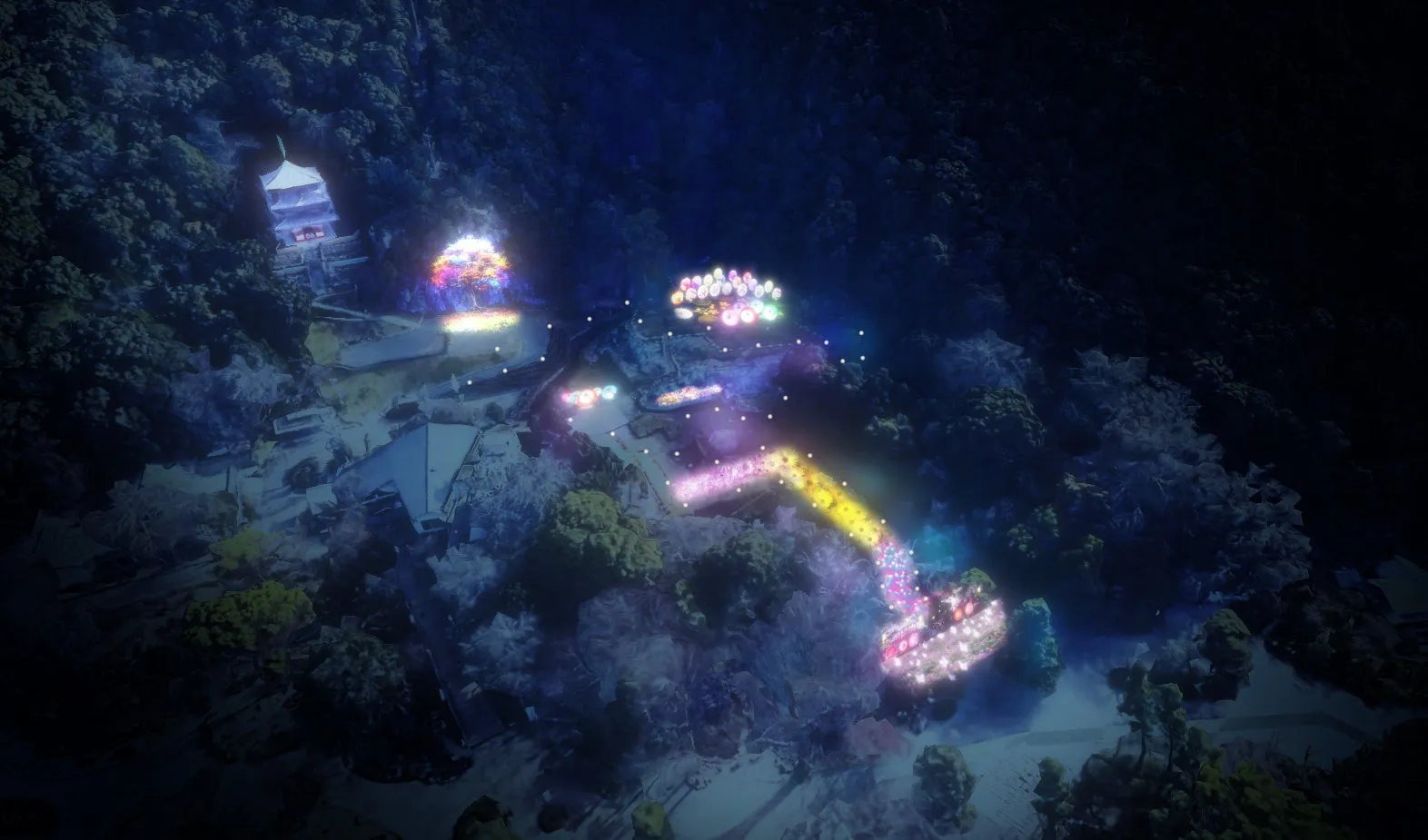 夜の山道を彩るイルミネーションの風景