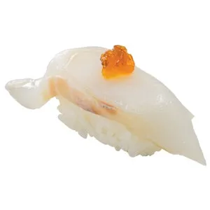 白身魚の握り寿司に、オレンジ色のトッピング