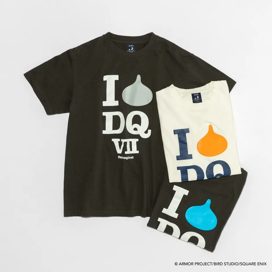 3枚のTシャツが重ねて置かれた写真。Tシャツには「I DQ VII Reimagined」の文字と、雫のようなデザインがプリントされている。