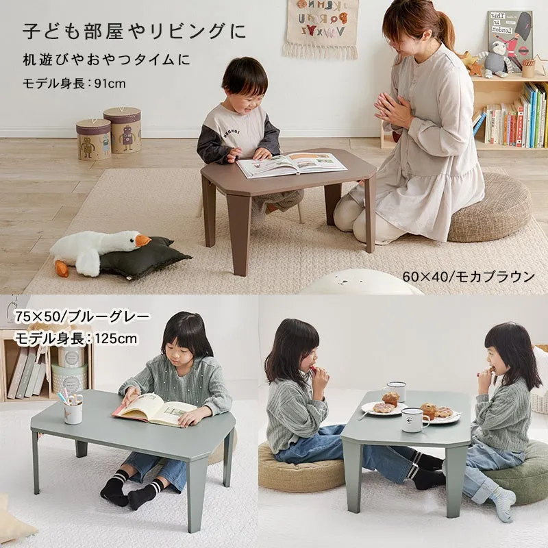 子供がテーブルを使う様子