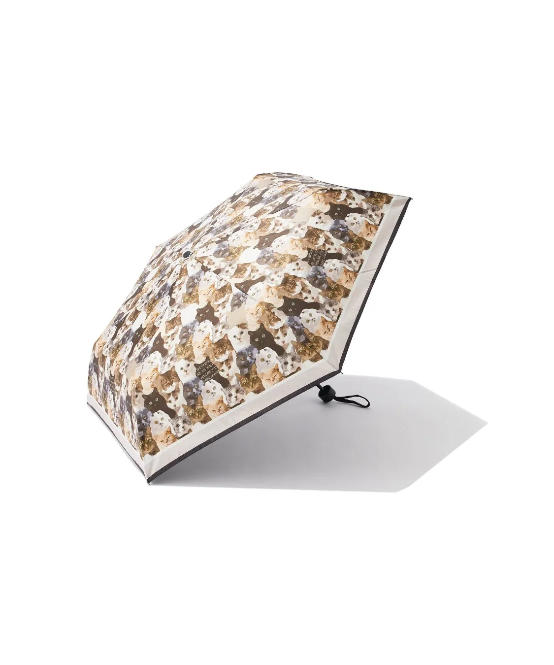 猫の顔がプリントされた傘