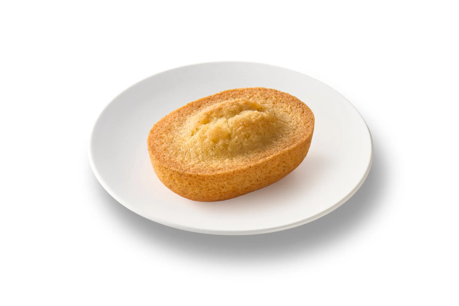 白い皿の上に置かれたフィナンシェの画像です。