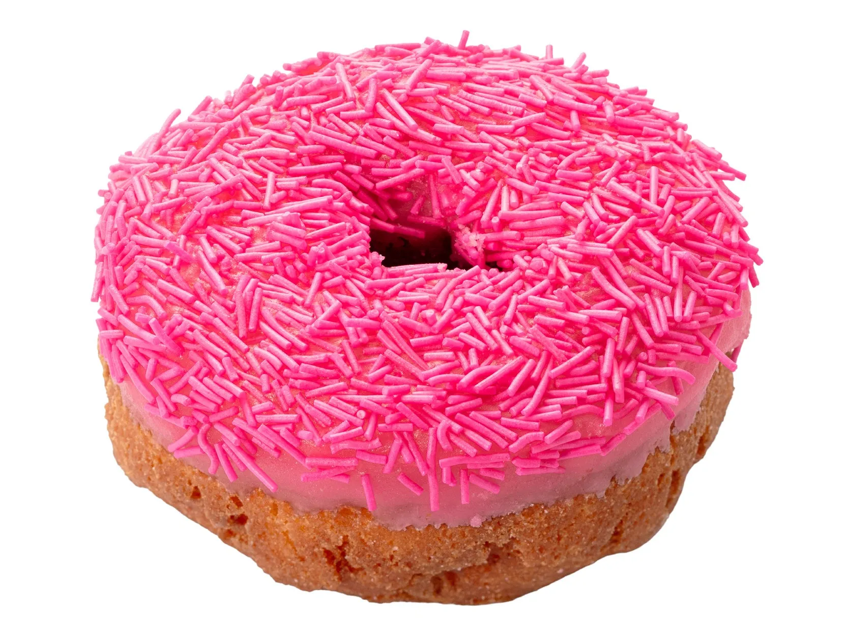 ピンク色のドーナツ。ピンク色のアイシングとピンク色のスプリンクルで覆われている。