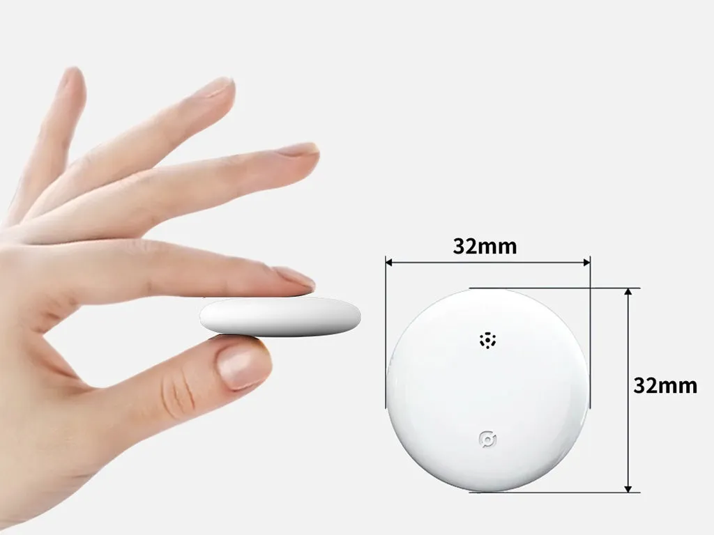 白い円形のデバイスが人の手で持たれており、デバイスのサイズが32mm x 32mmであることが示されています。