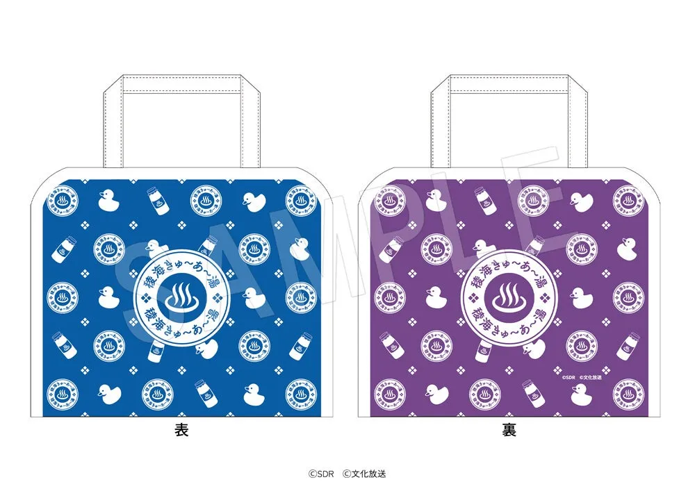 青と紫のトートバッグのデザイン。バッグの前面には温泉のシンボルと、アヒル、飲み物、温泉マークのパターンが描かれています。背面にも同様のデザインが紫で施されています。