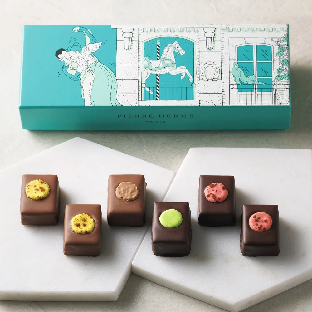 チョコレートと、ピエールエルメのロゴが入った箱が写っている画像。