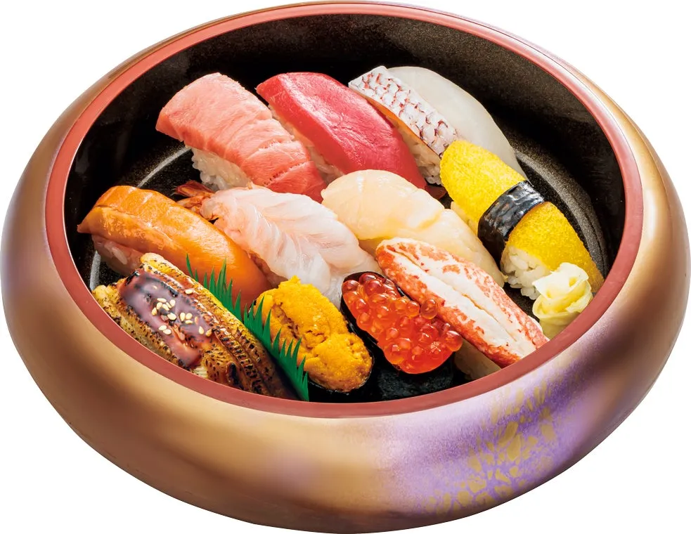 様々なお寿司が盛り付けられた写真。寿司桶に入っており、マグロ、サーモン、エビ、ウニ、イクラなど、様々な種類の寿司が確認できる。
