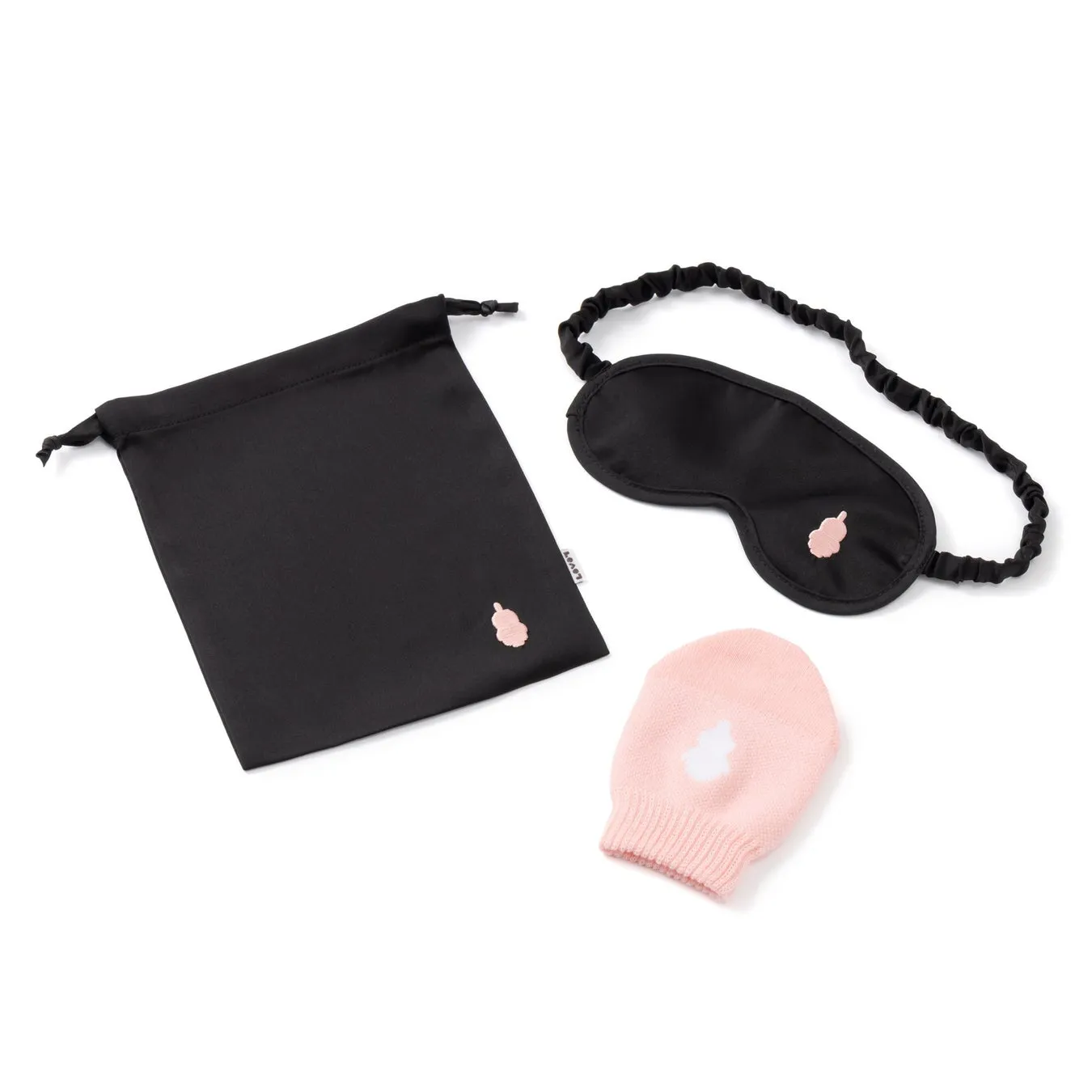 黒い巾着袋、黒いアイマスク、ピンクのミトンが白背景に配置された写真