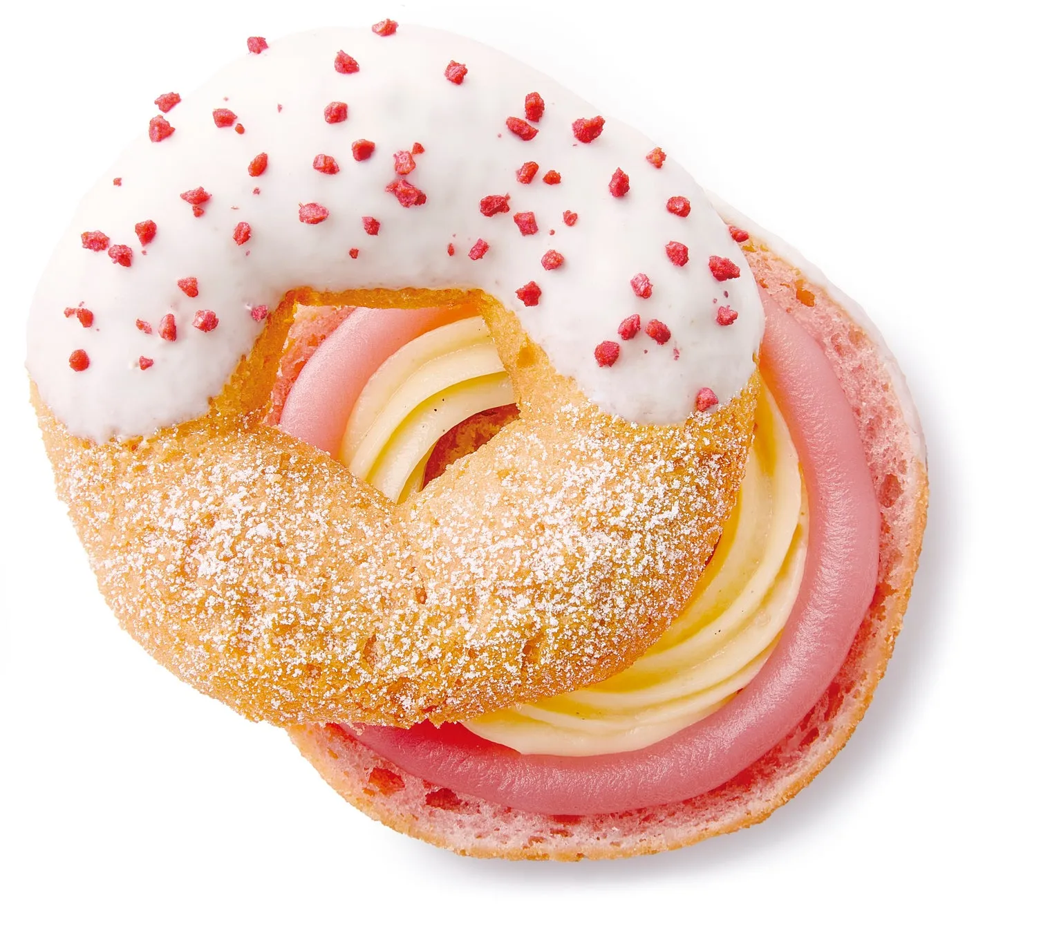白いアイシングと赤いトッピングがかかったドーナツ。ドーナツの中にはピンクとクリーム色のクリームが詰まっている。