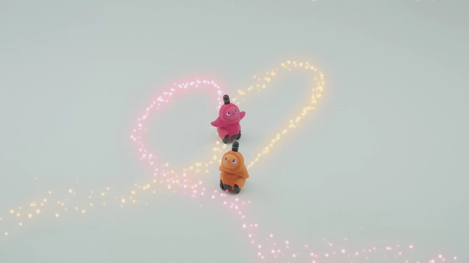 二匹のLOVOTがハートの光の中にいる可愛らしい画像