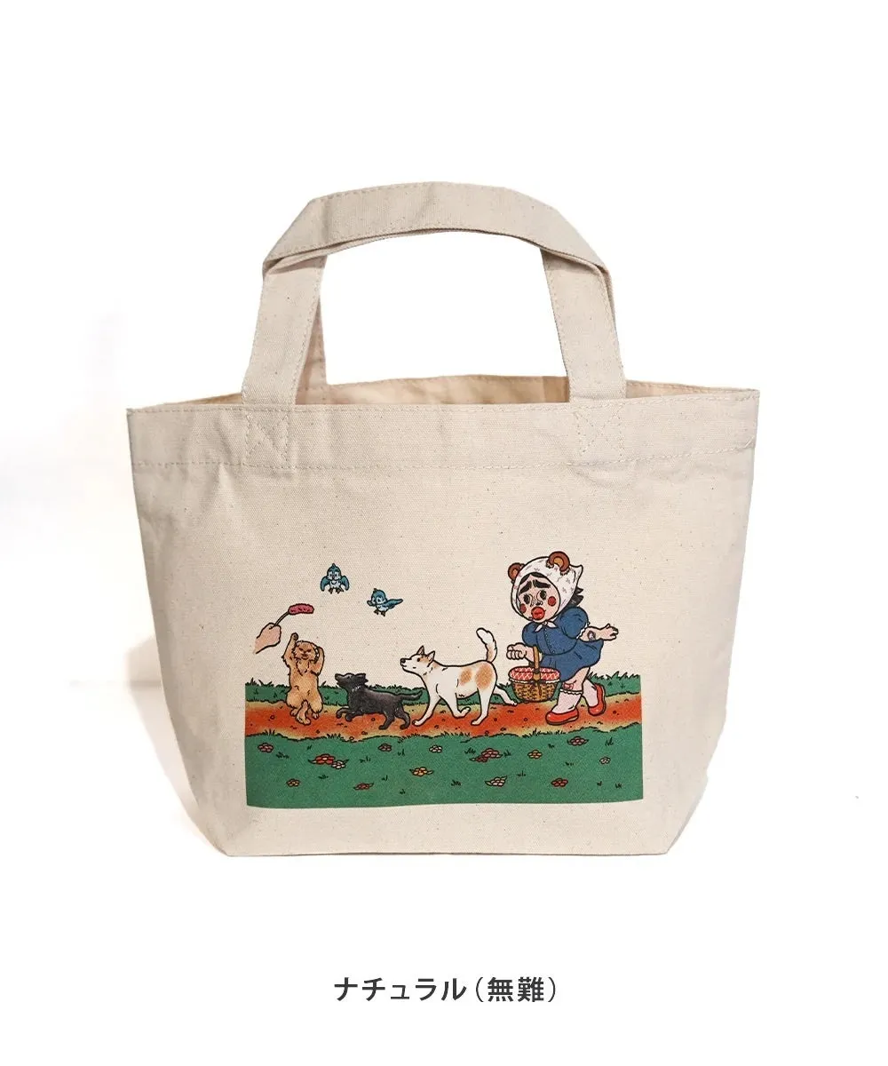 犬と子供のイラストが描かれたトートバッグ。