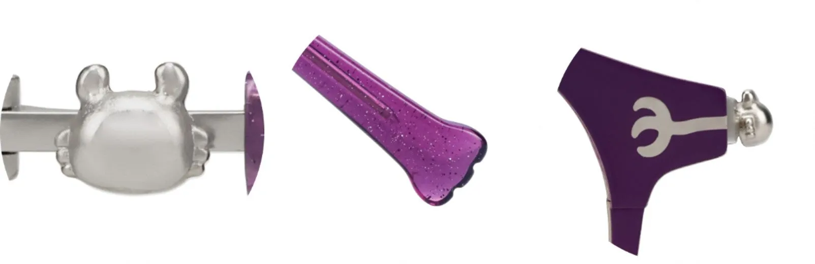 カフスボタン3種の写真。カニの形をした銀色のカフスボタン、紫色の長方形のカフスボタン、紫色の記号の付いたカフスボタン。