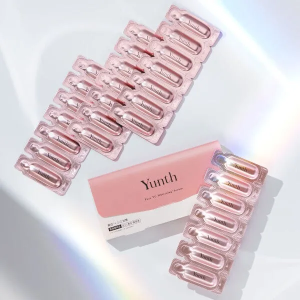 ピンク色のパッケージとアンプルがたくさん写っている写真です。美白美容液のようです。