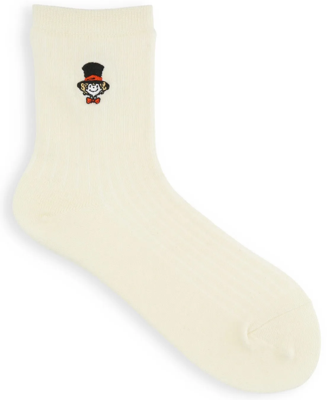 白地に、トップハットをかぶったキャラクターがワンポイントで刺繍された靴下。
