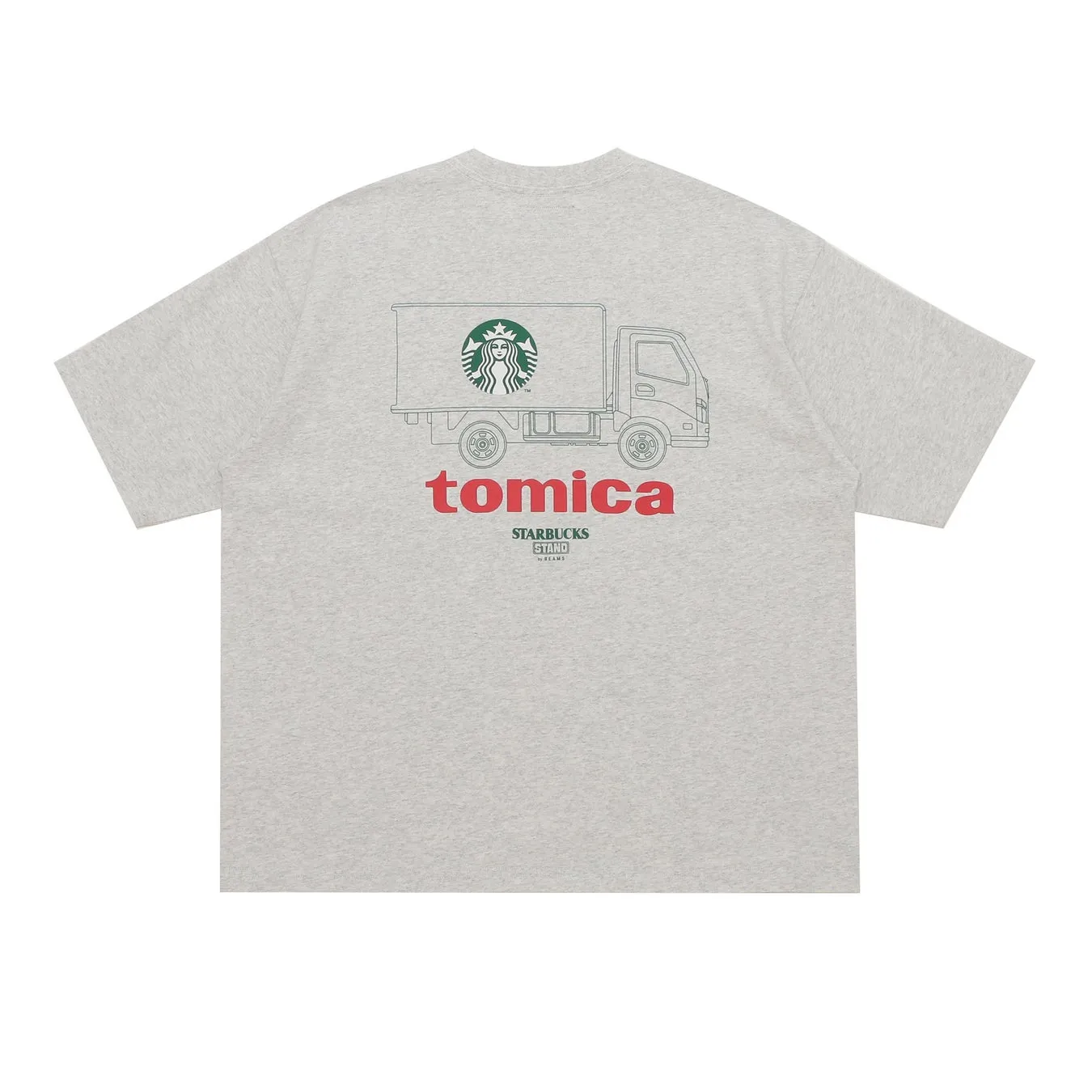 グレーのTシャツの背面に、スターバックスのロゴとトミカのトラックが描かれているデザイン。