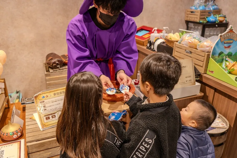 クエストの受付か景品交換所のような場所