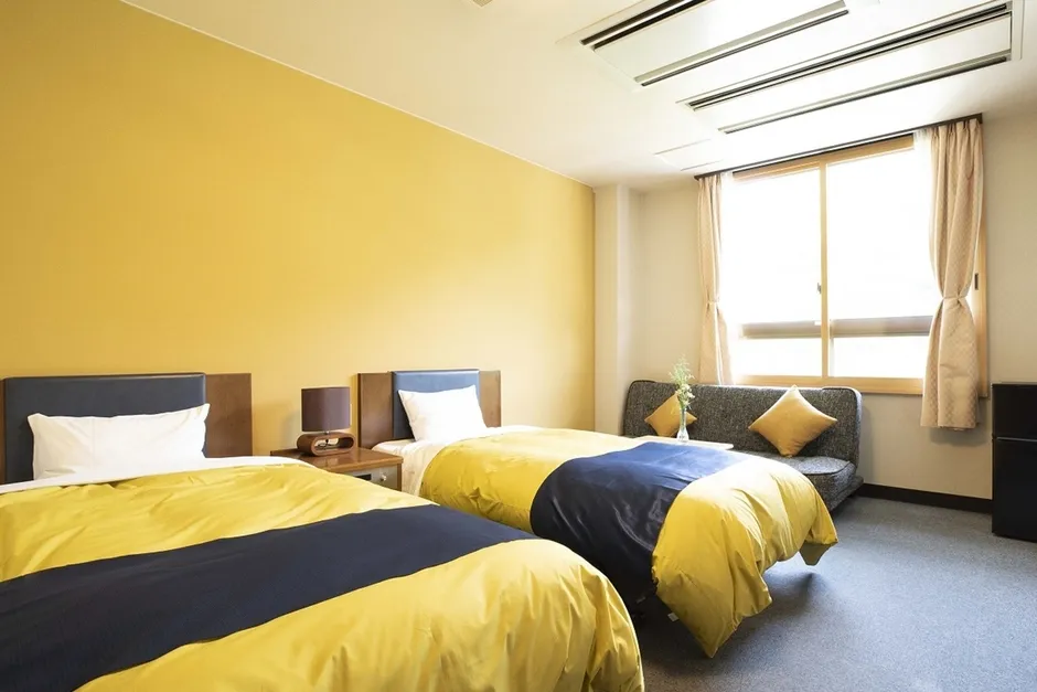 竹筒から流れる温泉